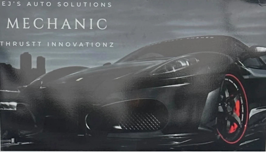 The front of Eric's business card: EJ'S Auto Solutions, Mechanic, Thrustt Innovationz, over a black sports car