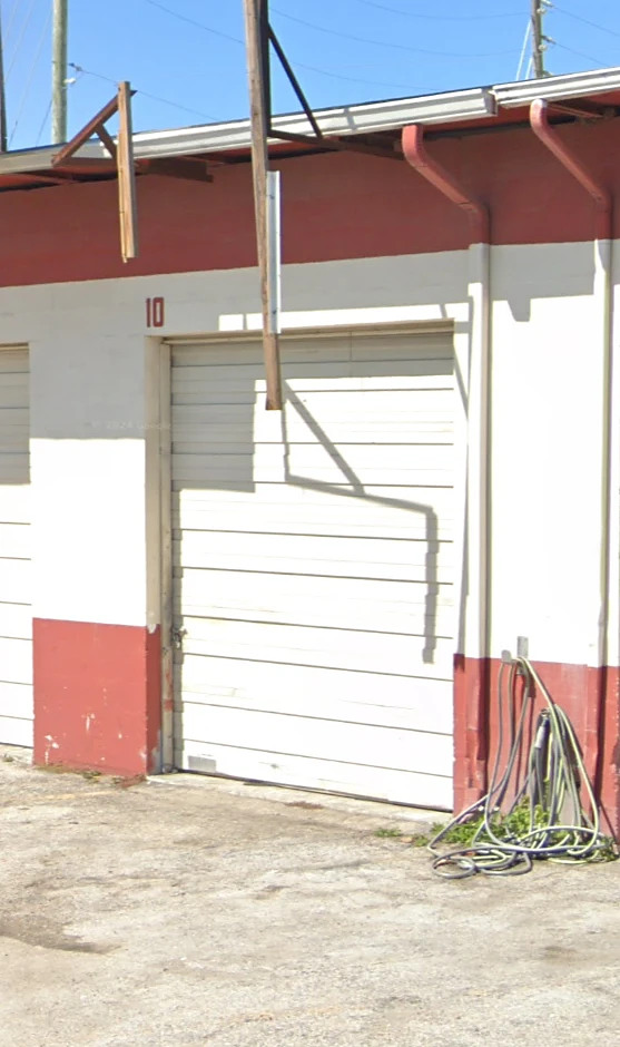 Gate 10, closed, with the 10 painted on the band above it